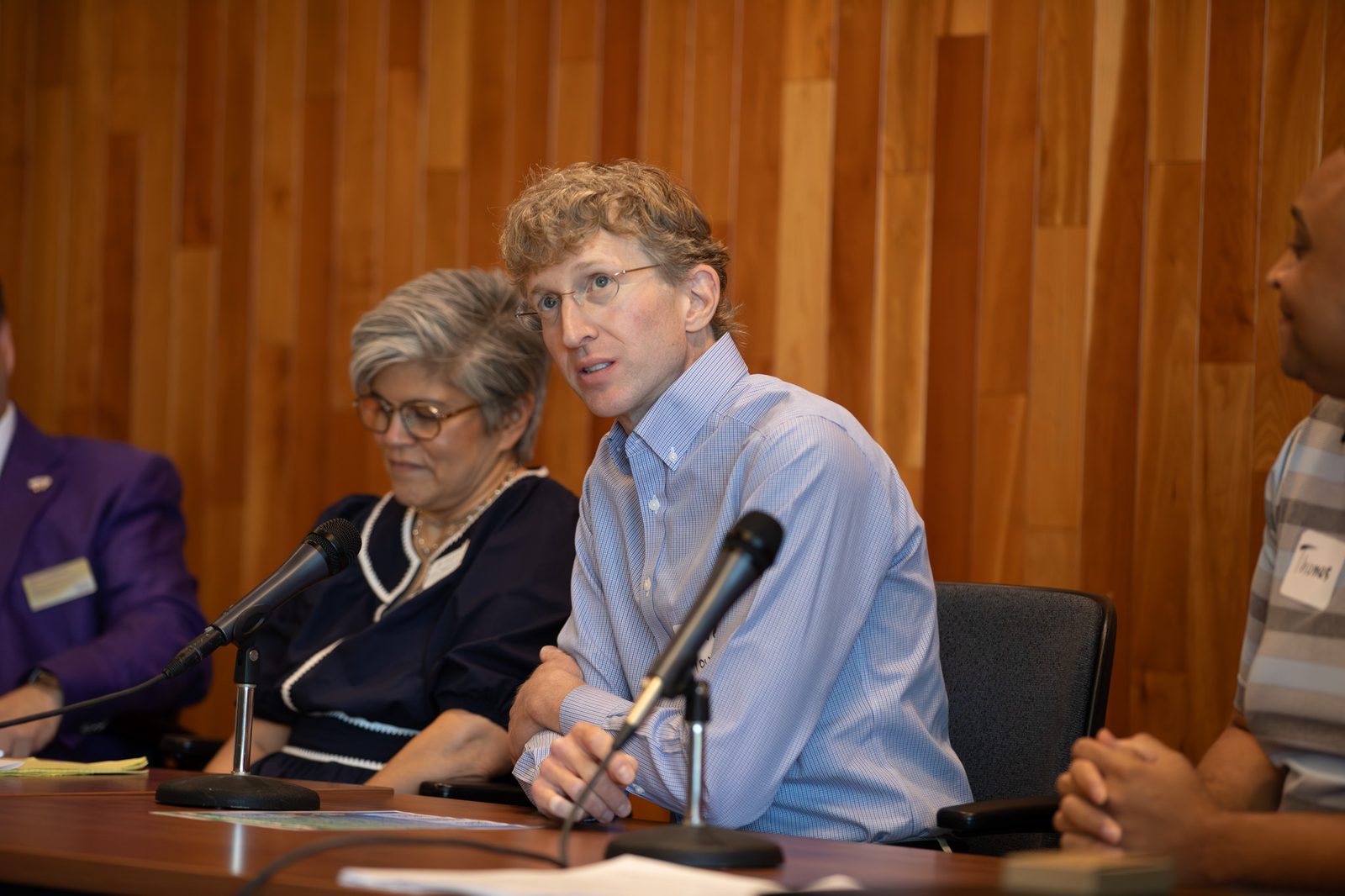 Panelists listening during the January AI Summit discussion